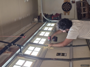 garage door spring replacement cost 2026