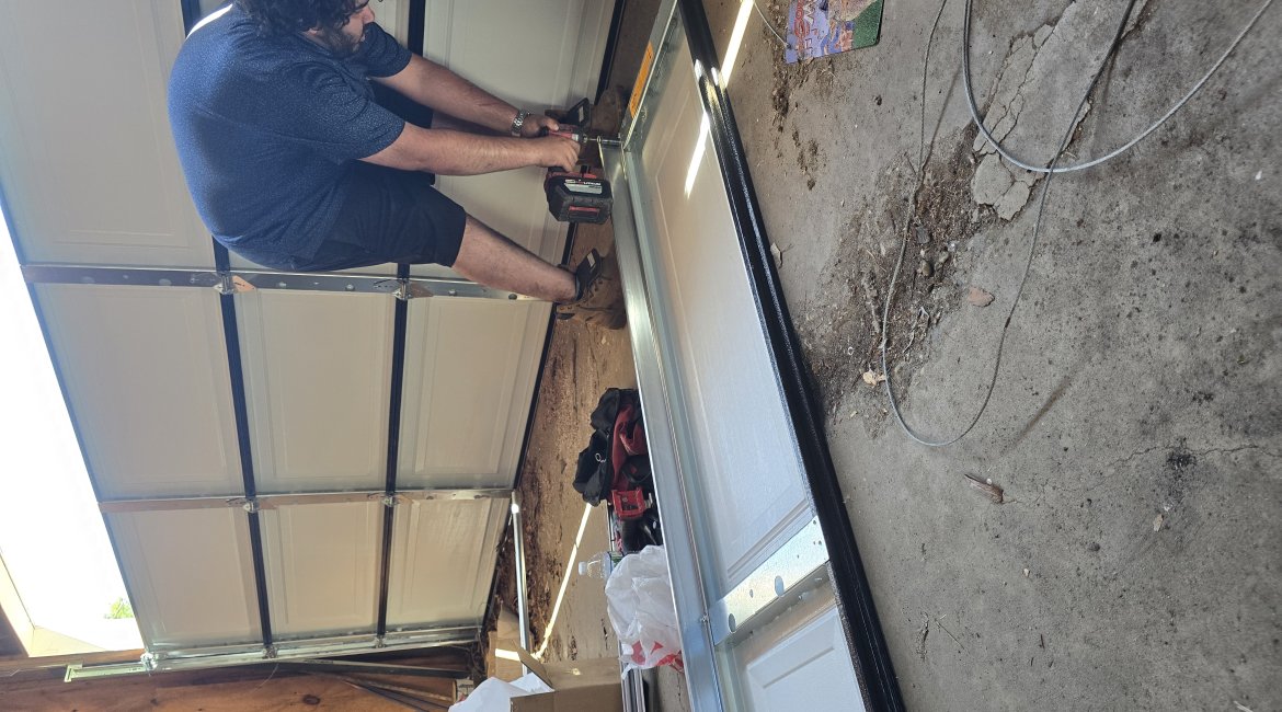 garage door panel replacement cost